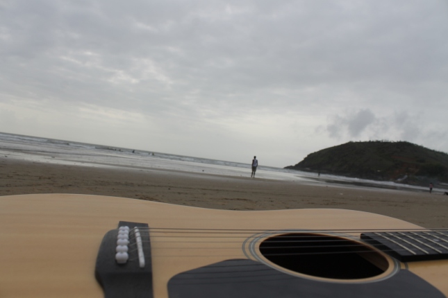 his highness's guitar and the beach